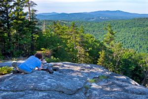 24  CN132B-Julian-photographing-Mount-Sunapee-from-Bog-Mountain,-SRKG-Trail-7,-Wilmot.jpg